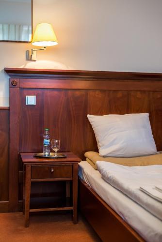 Una cama o camas en una habitación de Hotel Torysa