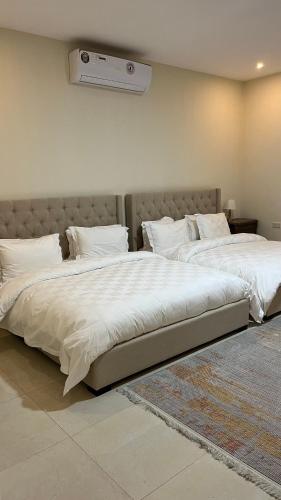 Postel nebo postele na pokoji v ubytování Aleef resort