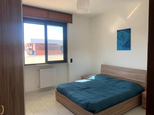 A bed or beds in a room at A Casa Tua