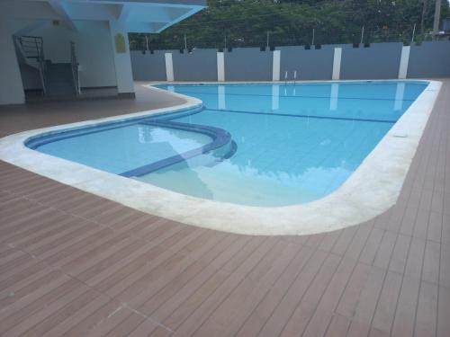a swimming pool on top of a building at Beach Breeze 001 in Mombasa