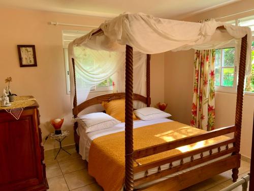 Postel nebo postele na pokoji v ubytování Gîte chez Marie