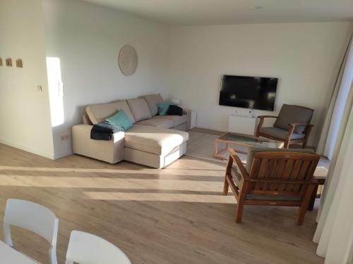 Μια τηλεόραση ή/και κέντρο ψυχαγωγίας στο Appartements-am-Hafen-No-2
