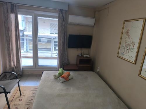 Katil atau katil-katil dalam bilik di Relax Place Alexandroupolis!