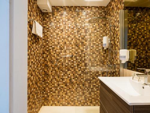 Koupelna v ubytování Hotel De Zeebries Budget