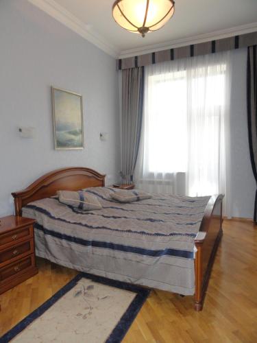 Ένα ή περισσότερα κρεβάτια σε δωμάτιο στο Park Hotel