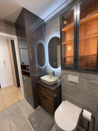 Koupelna v ubytování VG CITY STAY - airport & city