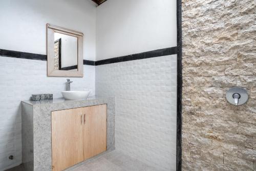 Ένα μπάνιο στο Melati Villa by iBali Management