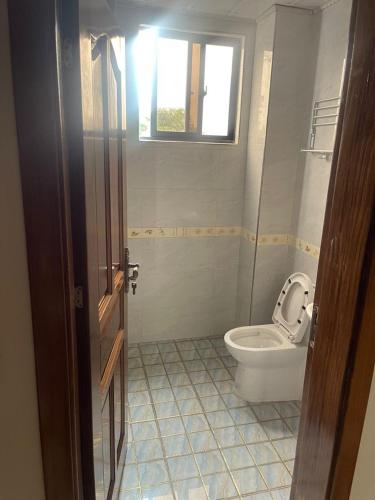 Ένα μπάνιο στο Apartment for rent in Kinshasa Gombe