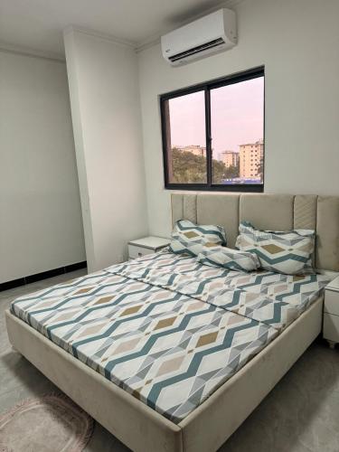 Postel nebo postele na pokoji v ubytování Apartment for rent in Kinshasa Gombe