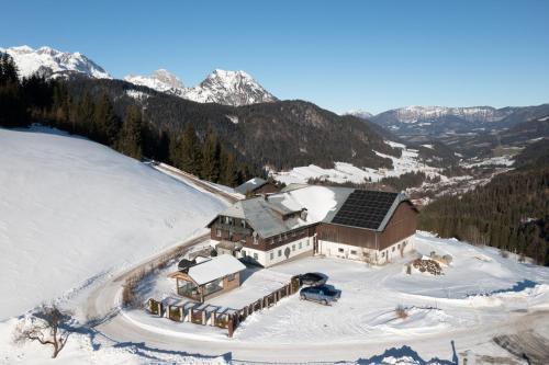 an aerial view of a house in the snow at Ferienwohnung Unterdürmoos in Annaberg im Lammertal