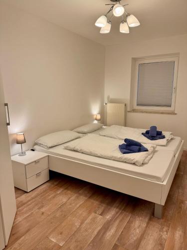 Voodi või voodid majutusasutuse Whg Deichblick toas