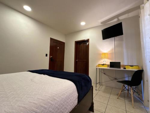 TV a/nebo společenská místnost v ubytování Master Suite Oro #1