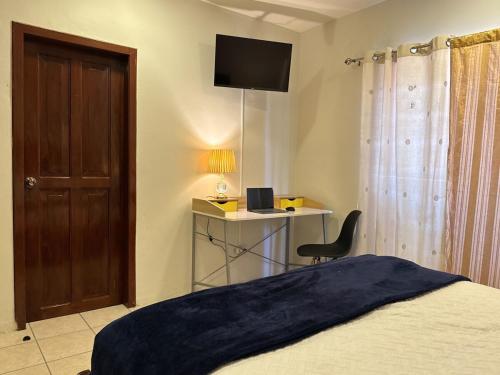 Postel nebo postele na pokoji v ubytování Master Suite Oro #1