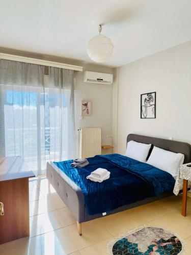 Un pat sau paturi într-o cameră la Cozy apartment 2