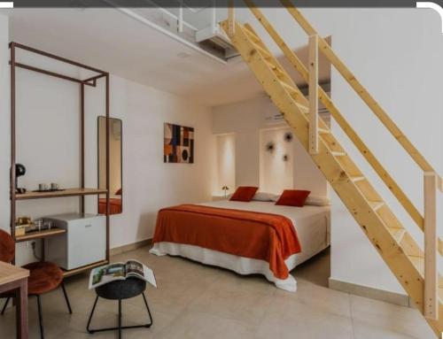Ένα ή περισσότερα κρεβάτια σε δωμάτιο στο sikelia rooms