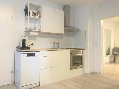 Kuchyň nebo kuchyňský kout v ubytování Ferienwohnung im Zentrum mit Parkplatz