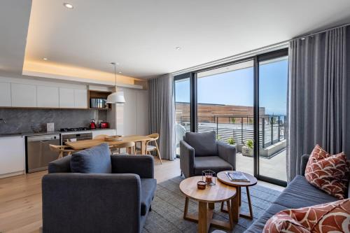 Η κουζίνα ή μικρή κουζίνα στο Plett Quarter Apartments