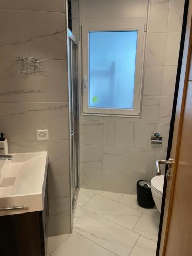Koupelna v ubytování Chambre chez AidArt