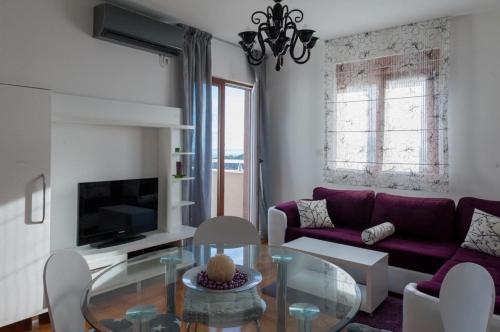 Μια τηλεόραση ή/και κέντρο ψυχαγωγίας στο Apartment Taurus