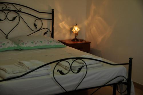 Ein Bett oder Betten in einem Zimmer der Unterkunft B&B La Seta Rossa
