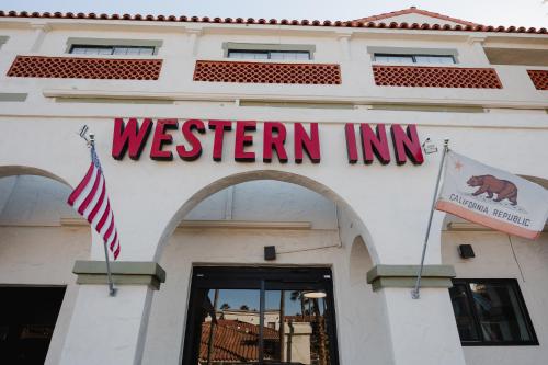 a westen inn sign on the side of a building at Old Town Western Inn in San Diego