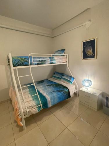 Postel nebo postele na pokoji v ubytování Vacation Home