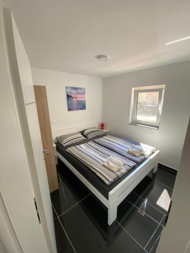 a bedroom with a bed in a room at House Melina in Vižinada