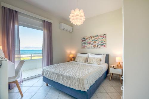 A bed or beds in a room at Sea Daffodil apartments