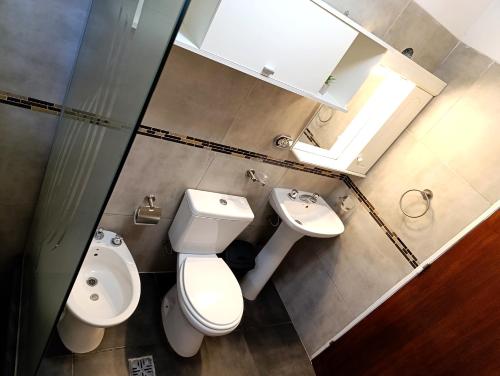 Un baño de Departamento Nuevo! 2 Dormitorios LA FALDA CORDOBA