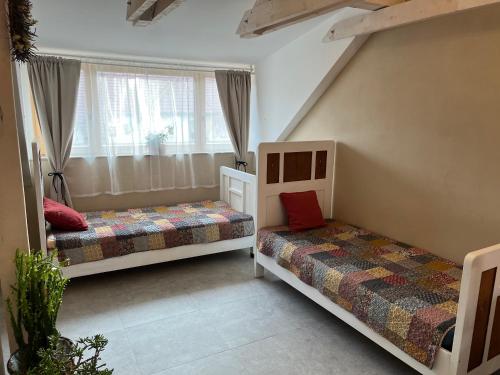 Postel nebo postele na pokoji v ubytování Vintage apartmán Mikulov, 2-4 osoby, 65m2