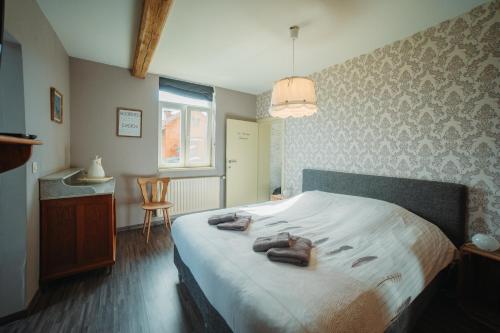 Postel nebo postele na pokoji v ubytování De Holsterhoeve