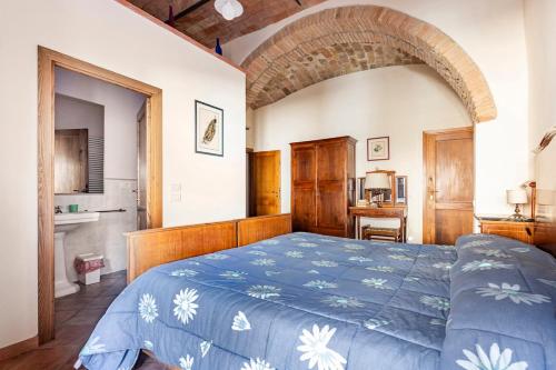 Ένα ή περισσότερα κρεβάτια σε δωμάτιο στο Casa di Romano - La Loggia