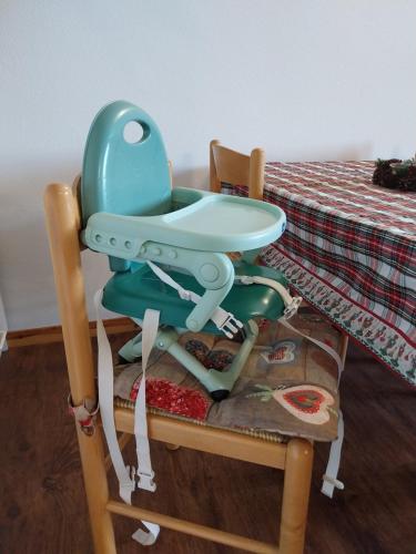 a blue high chair with a sink on top of it at Casa Cornella cir226 in Pila