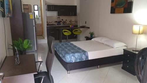 Katil atau katil-katil dalam bilik di Apartmento en Laureles