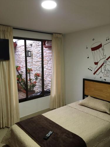 Hostal Amanariにあるベッド