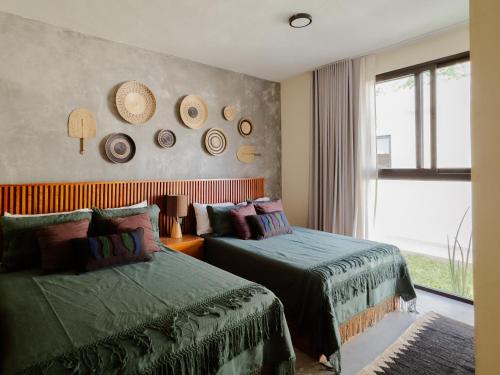 Ένα ή περισσότερα κρεβάτια σε δωμάτιο στο Casa Cactus Luxury Villa