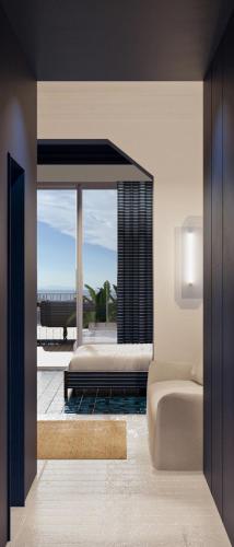 a bedroom with a bed and a large window at Grand Hotel Flora in Sorrento
