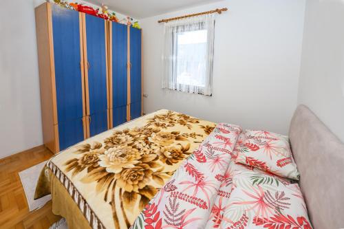 Postel nebo postele na pokoji v ubytování Tim Apartment