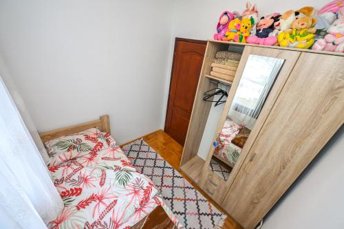 Ένα ή περισσότερα κρεβάτια σε δωμάτιο στο Tim Apartment