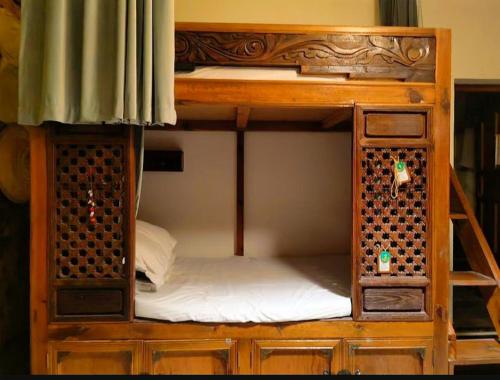 Letto o letti in una camera di Dali Lily Pad Inn