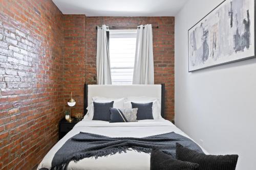Postel nebo postele na pokoji v ubytování Stylish Apt in West New York 20 Min to Times Square