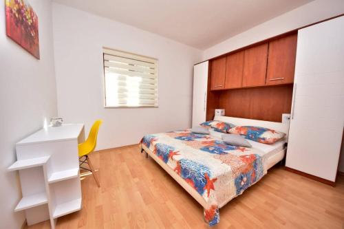 Posteľ alebo postele v izbe v ubytovaní Apartment Roko