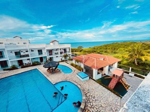 an aerial view of a resort with a swimming pool at Granito e Jasmin in Conde