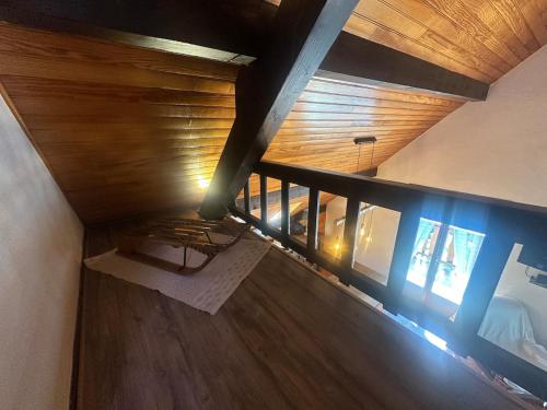 an overhead view of a room with a balcony at Chalet 4 6 Pers Climatisation Proche St Francois in Saint-Martin-sur-le-Chambre
