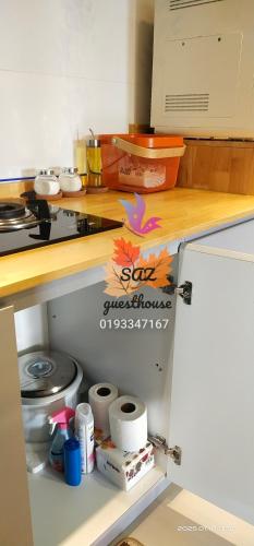 a drawer in a kitchen with a stove at SAZ Guesthouse in Semenyih