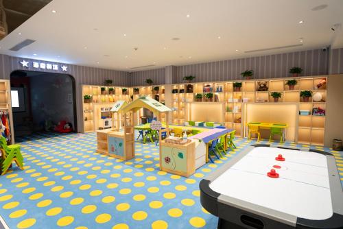 a room with a toy store with a table and chairs at Crowne Plaza Suzhou by IHG in Suzhou