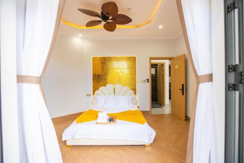 Ένα ή περισσότερα κρεβάτια σε δωμάτιο στο Villa An Nguyên Phan Rang