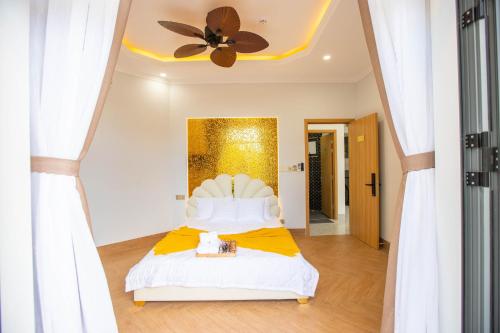 Ένα ή περισσότερα κρεβάτια σε δωμάτιο στο Villa An Nguyên Phan Rang