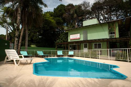 Πισίνα στο ή κοντά στο Encantada Floripa