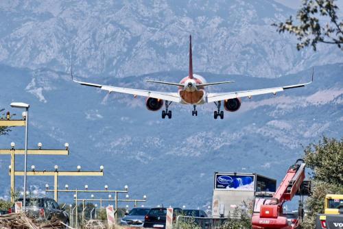 an airplane is taking off from a parking lot at Villa Sonja Apartments in Krasici